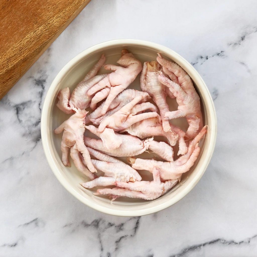 Chicken feet in a dog bowl