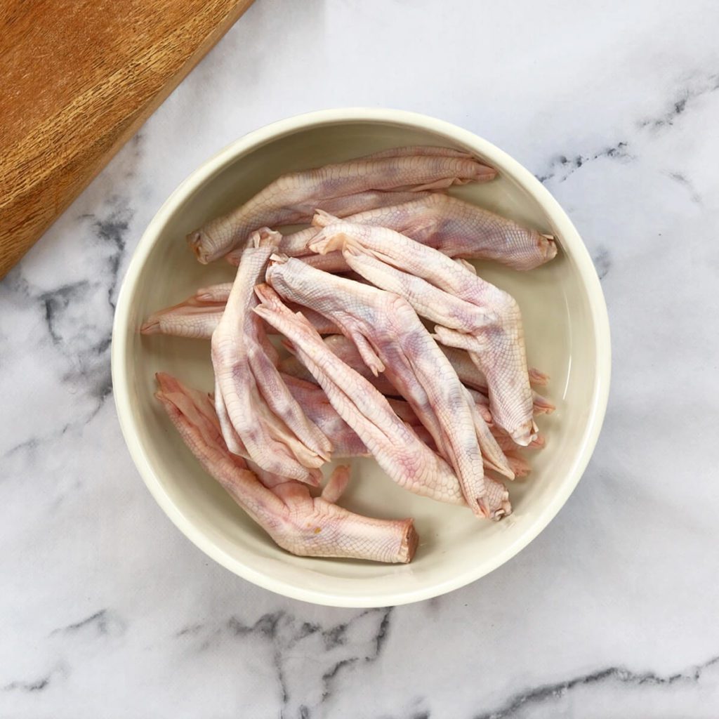 Duck feet in a dog bowl
