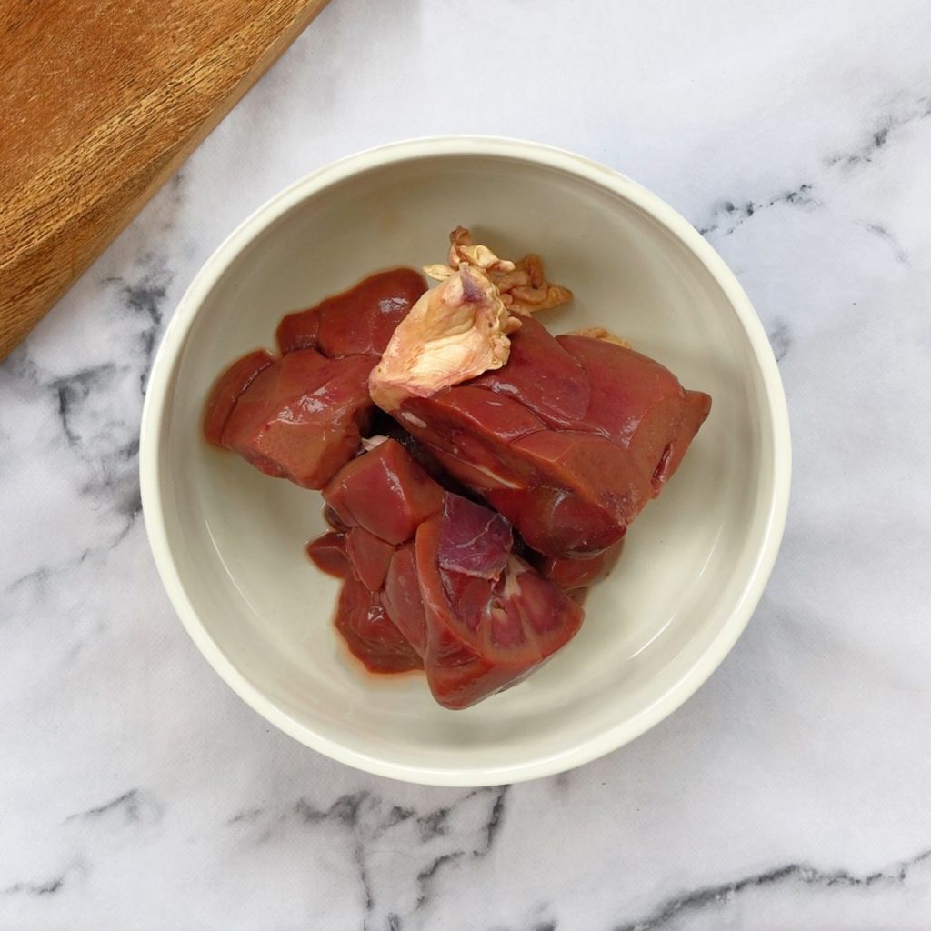 Lamb kidney chunks in a dog bowl