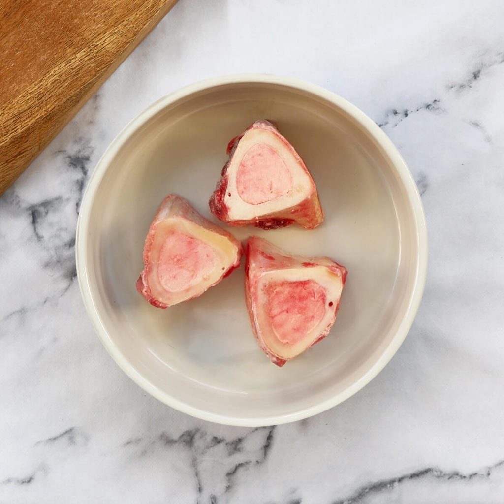 Mini marrow bones in a dog bowl